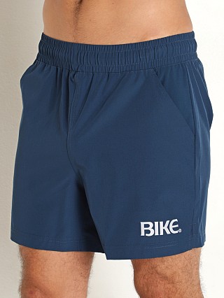 Model in navy Bike Athletic 4-Way Stretch Gym Short