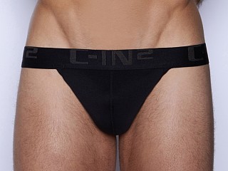 Model in black C-IN2 Core Y-Back Thong