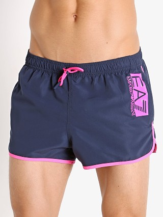 Model in blue navy Emporio Armani EA7 Fluo Logo Swim Shorts