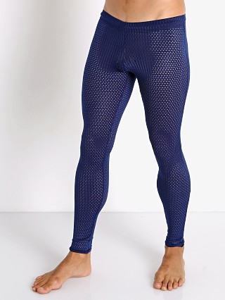 Model in navy McKillop Sleek Expose Mesh Tights