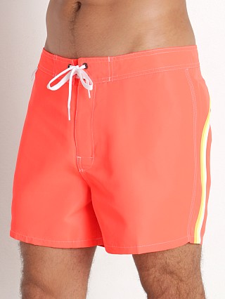 Model in fluorescent orange 11 Sundek 14" Classic Low-Rise Boardshort