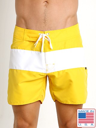 Model in yellow Sauvage Surf California Classic Boardshort