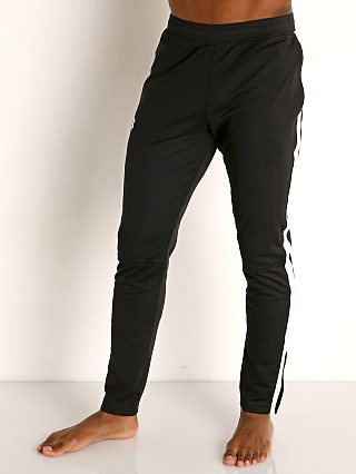 Model in black/white Under Armour Sportstyle Pique Track Pant