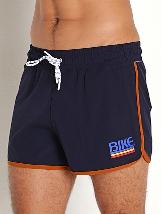 Model in navy Bike Athletic Retro Logo Track Shorts