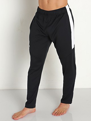 Model in black/white Under Armour Rival Knit Pant