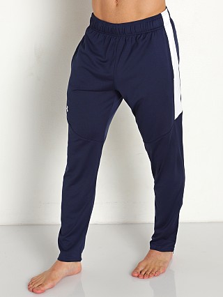 Model in midnight navy/white Under Armour Rival Knit Pant