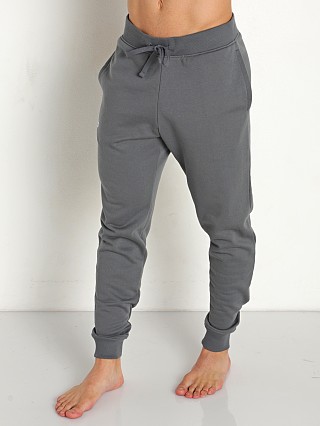 Model in pitch gray/onyx white Under Armour Rival Cotton Joggers