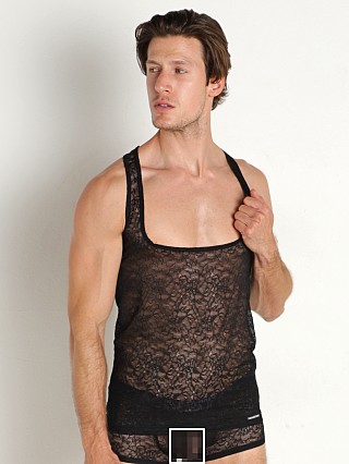 Model in black Manstore Lace Mesh Tank Top