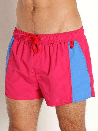 Model in pink Diesel Caybay Swim Shorts