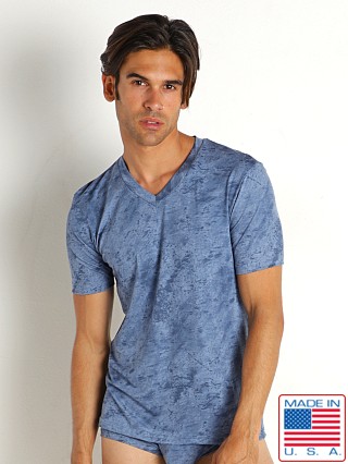 Model in denim Rick Majors Sandstone V-Neck Tee