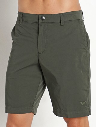 Model in military green Emporio Armani Cotton Twill Shorts