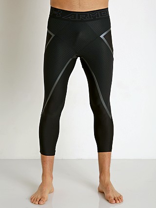 Model in black Under Armour Core 3/4 Compression Legging