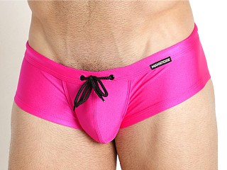 Model in hot pink Manstore Beach Club Swim Trunks