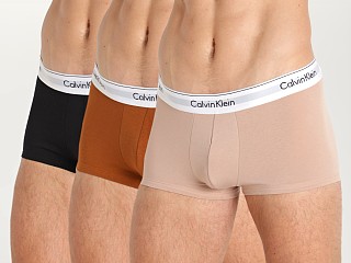 Model in sandalwood/cedar/black Calvin Klein Modern Cotton Stretch Naturals Low Rise Trunk 3-Pk