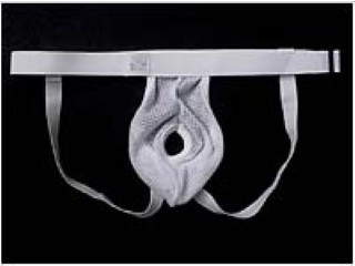 Model in white AT Surgical Suspensory with Leg Straps