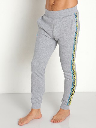 Model in heather/taxi/blue Under Armour Curry Fleece Jogging Pants