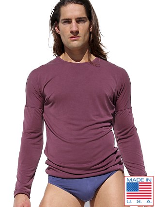 Model in orchid Rufskin Max Longsleeve Kimono Crew Neck Shirt