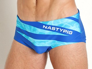 Model in blue Nasty Pig Splash Swim Sunga