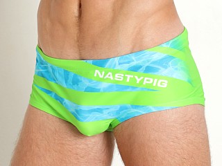 Model in neon green Nasty Pig Splash Swim Sunga