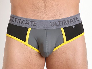 Model in black/grey/yellow Tulio Ultimate Power Pouch Backless Brief Black/Grey/Yell