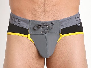 Model in black/grey/yellow Tulio Ultimate Lace-up Power Pouch Brief