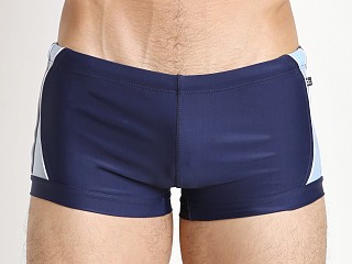 Model in navy Tulio Pop Panels Square Cut Swim Trunk