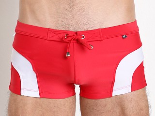 Model in red/white Tulio Surf Curve Square Cut Swim Trunk