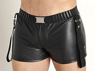 Model in black STUD Bray Faux Leather Strap Shorts