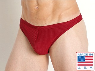 Model in burgundy LASC Nylon Rib Swim Thong