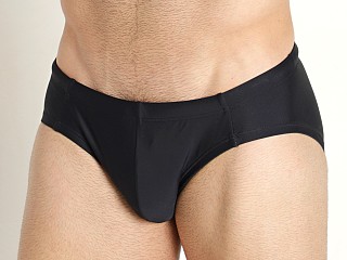 Model in black Nasty Pig Emboss Swim Bikini