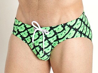 Model in neon green Nasty Pig Neon Brandmark Swim Bikini