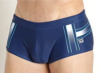 Model in navy Nasty Pig Off The Grid Square Cut Swim Trunk