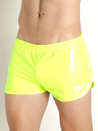 Model in neon yellow Modus Vivendi Shiny Vinyl Line Short