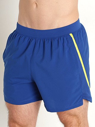 Model in blue mirage Under Armour Launch 5" Running Short