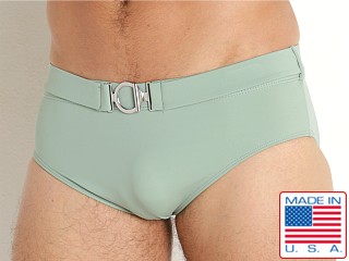 Model in sage Rick Majors Retro Belted Swim Brief