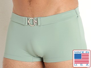 Model in sage Rick Majors Retro Belted Swim Trunk