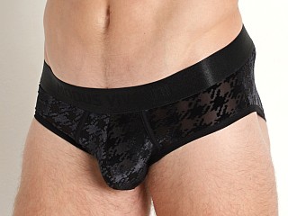 Model in black Modus Vivendi Houndstooth Classic Brief