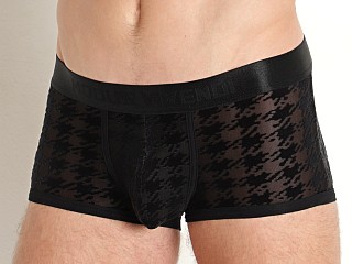 Model in black Modus Vivendi Houndstooth Trunk