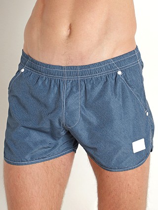 Model in marine Modus Vivendi Jeans Jogging Cut Swim Shorts