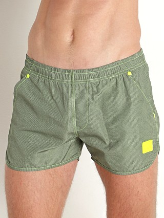 Model in khaki Modus Vivendi Jeans Jogging Cut Swim Shorts