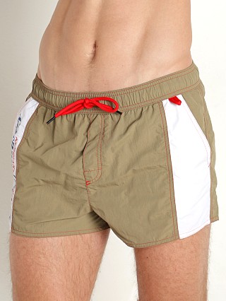 Model in olive Diesel Caybay Swim Shorts