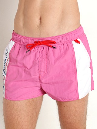 Model in bubble gum Diesel Caybay Swim Shorts