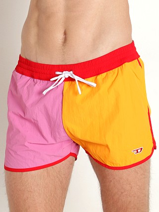 Model in tangerine Diesel Jesper Swim Shorts