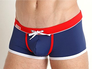 Model in navy TOF Paris Holidays Swim Trunks