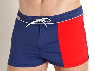 Model in navy TOF Paris Holidays Swim Shorts