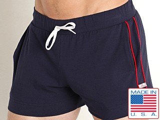 Model in navy American Jock Phys Ed Volley Pocket Short