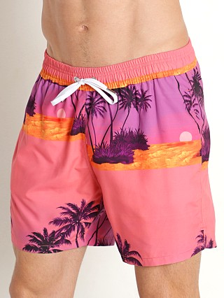 Model in sunset palms Benson Copa Swim Shorts