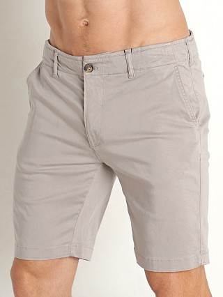 Model in light grey Benson Stretch Cotton Como Shorts