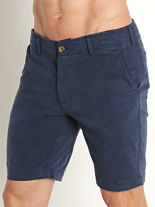 Model in navy Benson Stretch Cotton Como Shorts