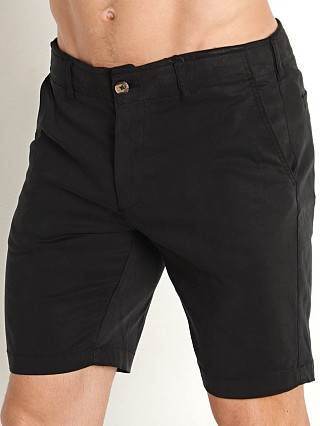 Model in black Benson Stretch Cotton Como Shorts